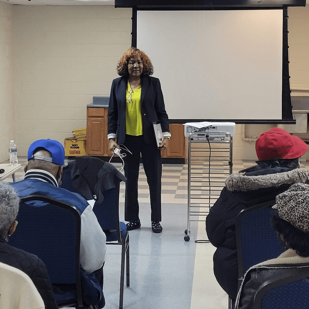 Leigh teaching about Medicare as guest speaker at local church event