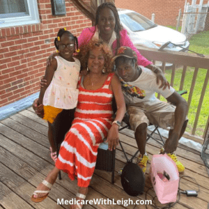 Leigh Battle with her family on her deck in the Richmond summer.